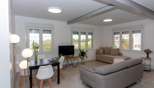 Acogedora vivienda con jardín andando a la playa.