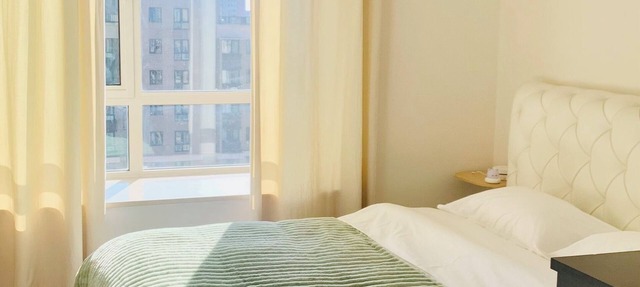 Charming shared separate room in 4bedroom Apt in Beijing downtown with AC, WiFi