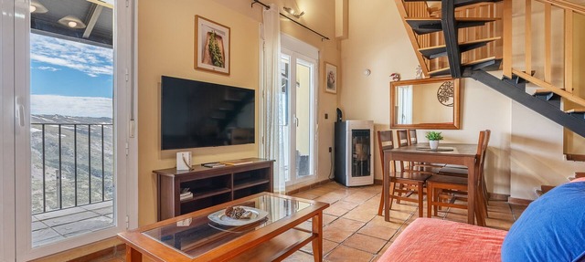 Apartamento vacacional "Duplex 23 E" con vistas a la montaña, terraza privada y Wi-Fi