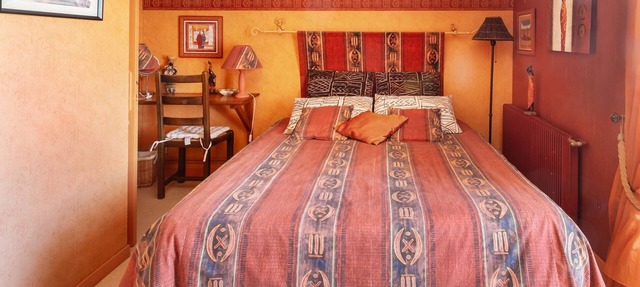 Habitación de huéspedes La Savane con piscina compartida y aire acondicionado