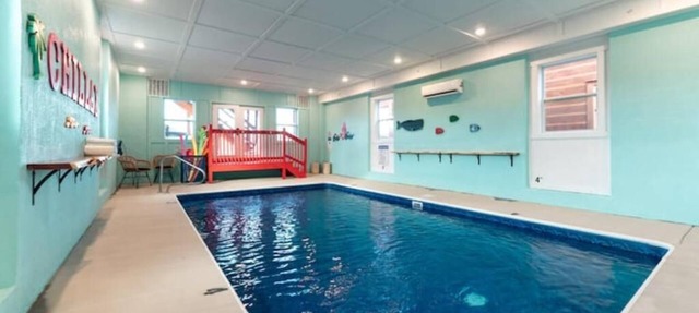 Luxurious Amazing 1 of a Kind Cabin InCabinHeated Pool Sauna Games Sleeps 30