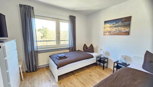 MR Living I modernes Apartment mit Einzelbetten, voll ausgestattete Küche, Balkon, WLAN, Parkplatz, ideal für Monteure I GI03 I GI02