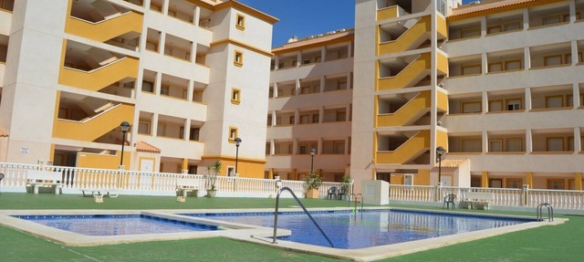 Ático con vistas al mar desde la terraza, balcón, piscina común