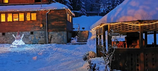 Romantic chalet in the forest area, with a stream in the garden