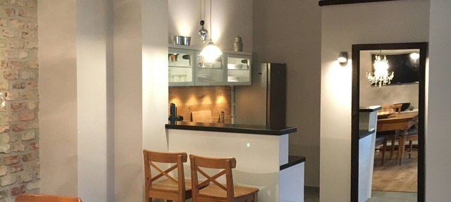 Pequeña casa de huéspedes en el corazón verde de la ciudad