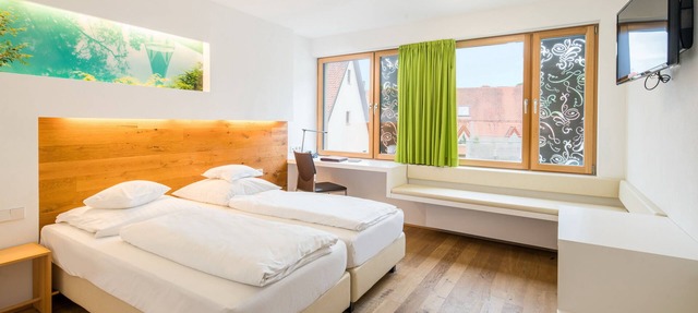 Habitación superior con ducha.