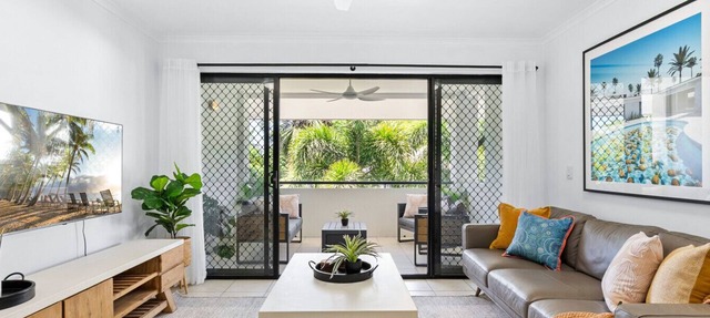 Tropical Top-Floor Retreat with Pool Access