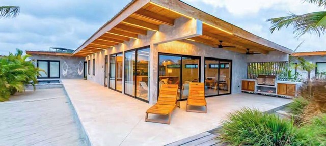 Waterfront villa with splash pool, private terrace, beach access & WiFi