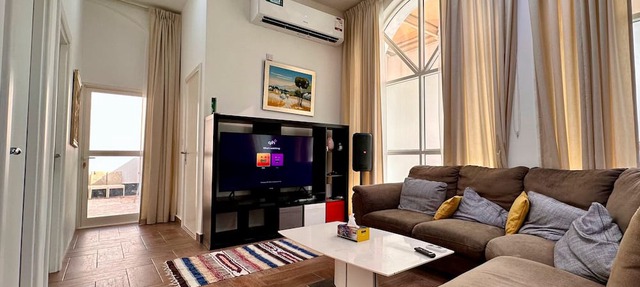 Heart of Doha Elegant Home with Shared Swimming Pool