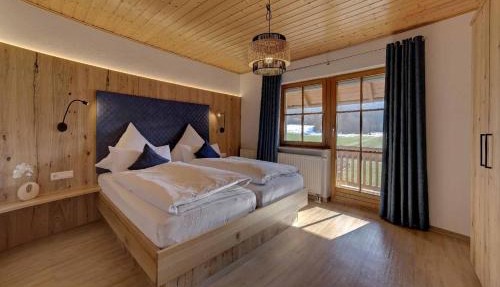 Ferienwohnungen Holzferienhäuser Leithenwald